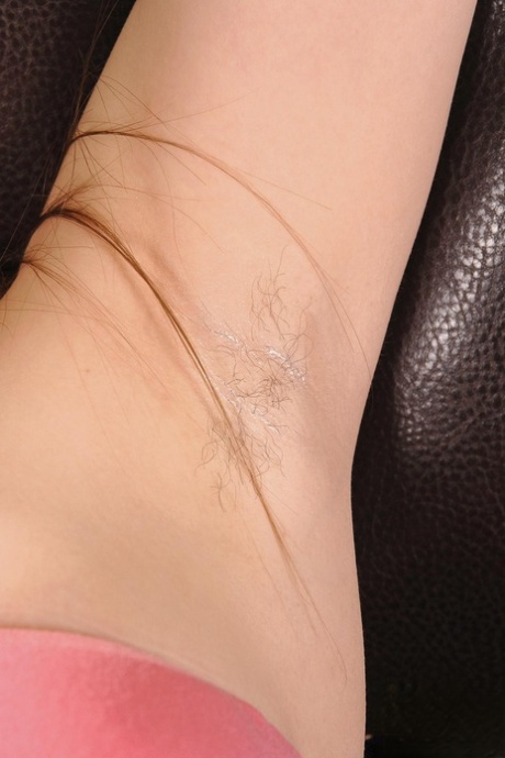 Sweet solo girl Beata Undine reveals unshaven pits and twat while disrobing